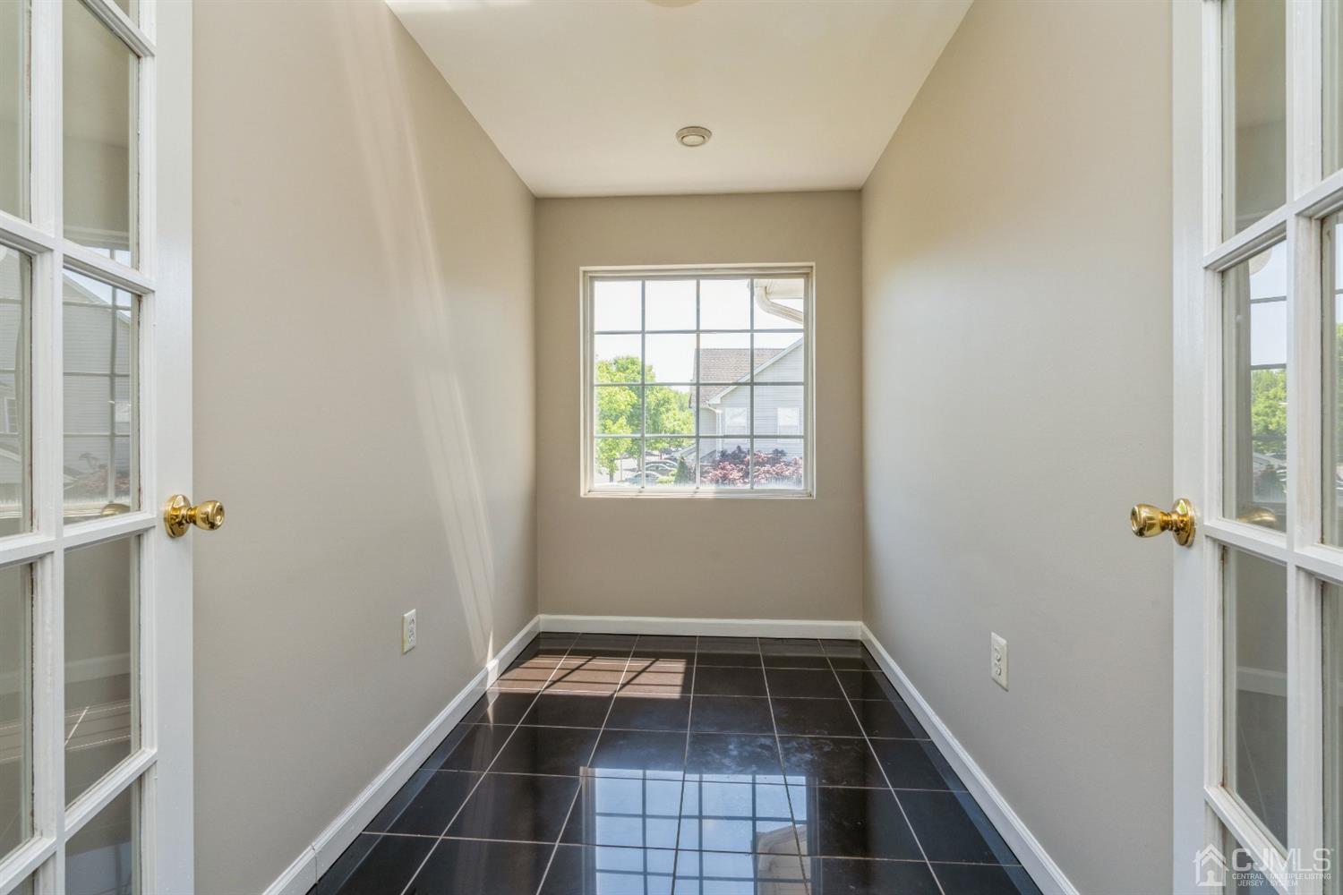 202 Hawthorne Road North Brunswick, NJ 08902 - Photo 15 of 21 a view of a hallway with a window