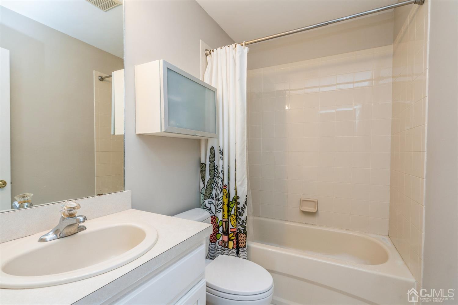 202 Hawthorne Road North Brunswick, NJ 08902 - Photo 16 of 21 a bathroom with a sink toilet and shower