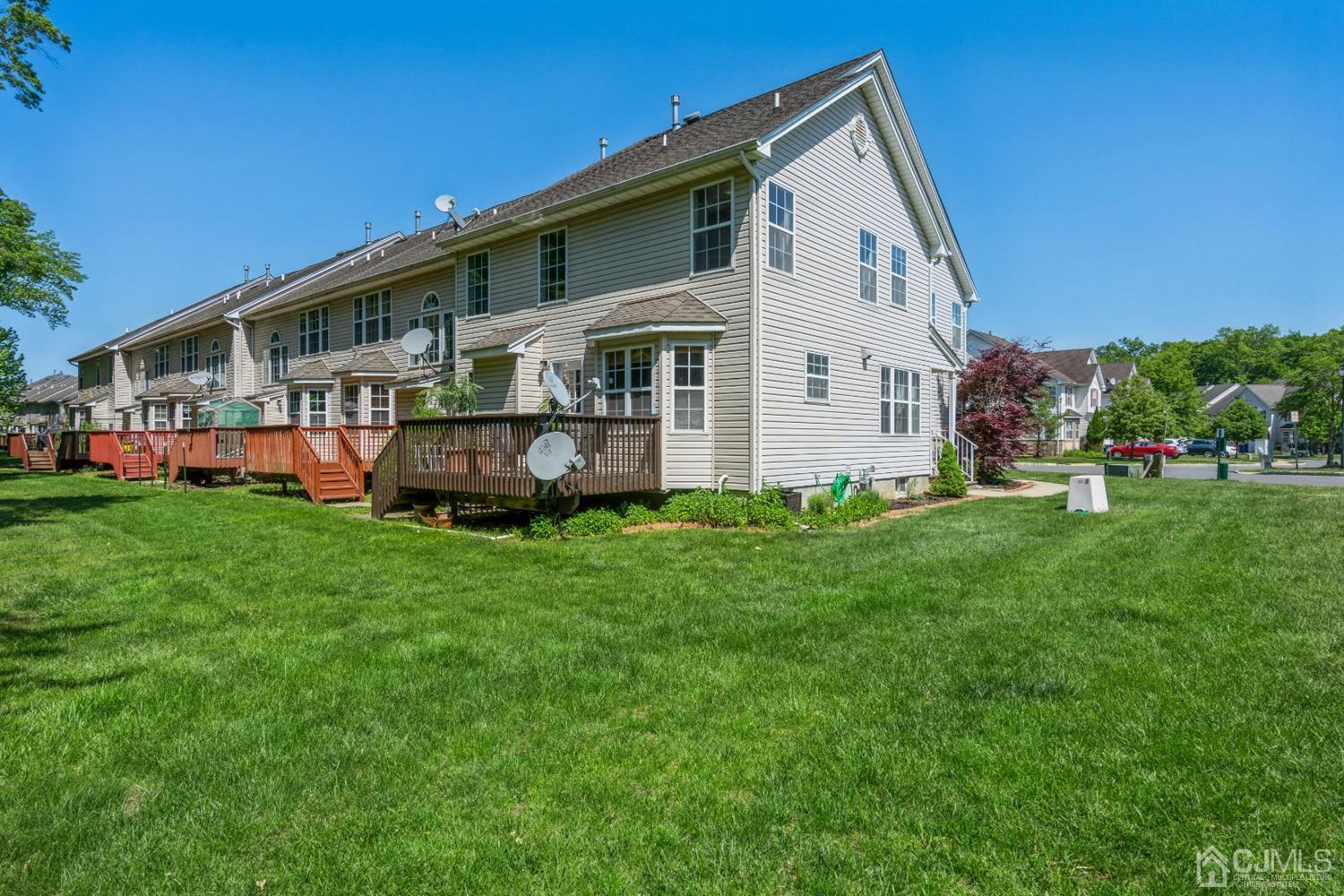 202 Hawthorne Road North Brunswick, NJ 08902 - Photo 20 of 21 a front view of house with yard and green space