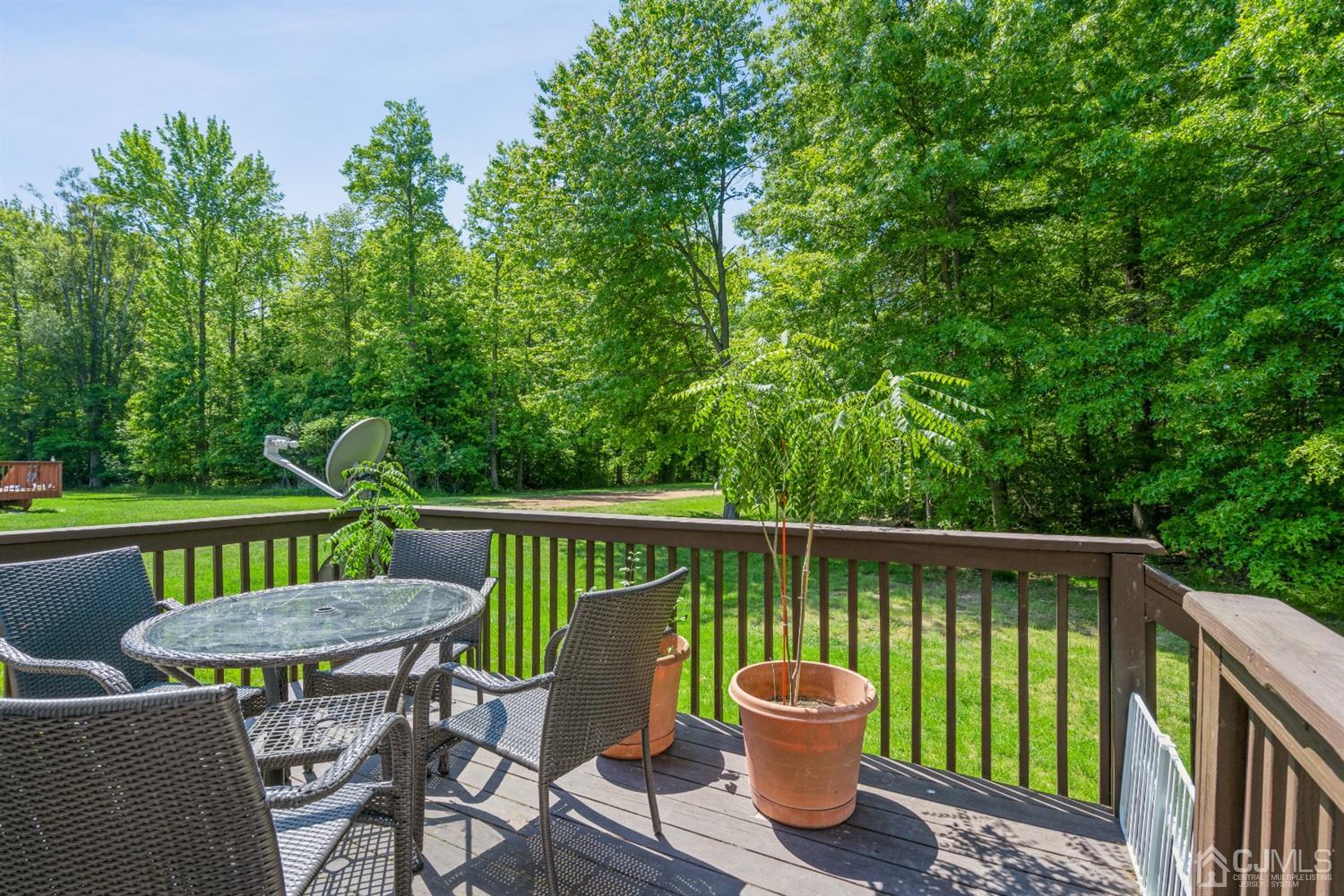 202 Hawthorne Road North Brunswick, NJ 08902 - Photo 21 of 21 a view of a chairs and table in the patio