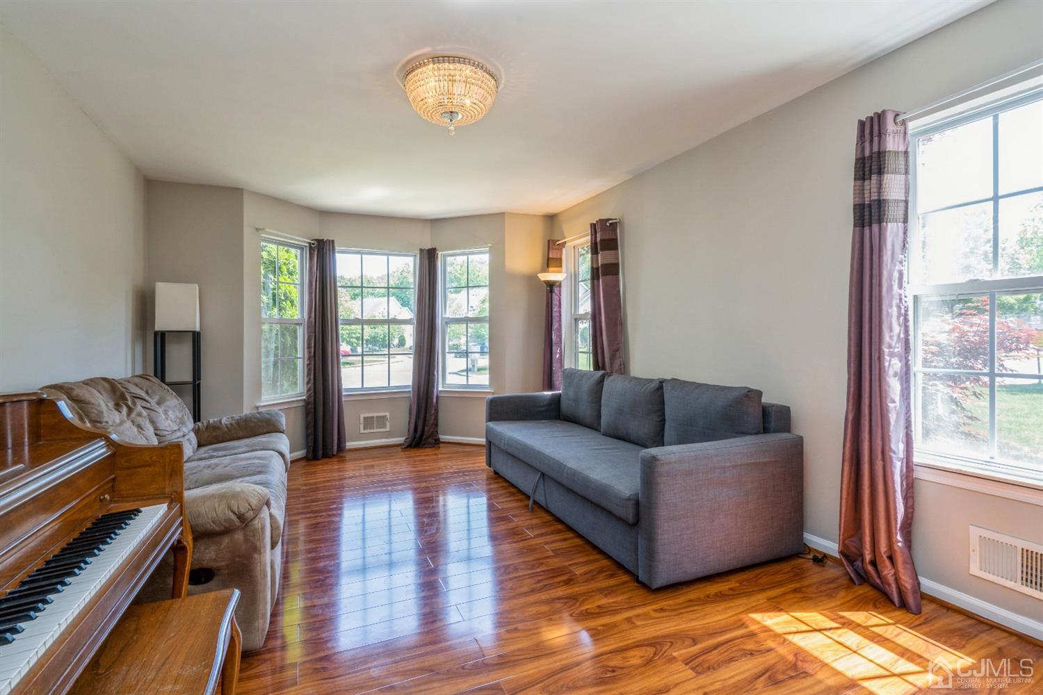 202 Hawthorne Road North Brunswick, NJ 08902 - Photo 4 of 21 a living room with furniture and a window