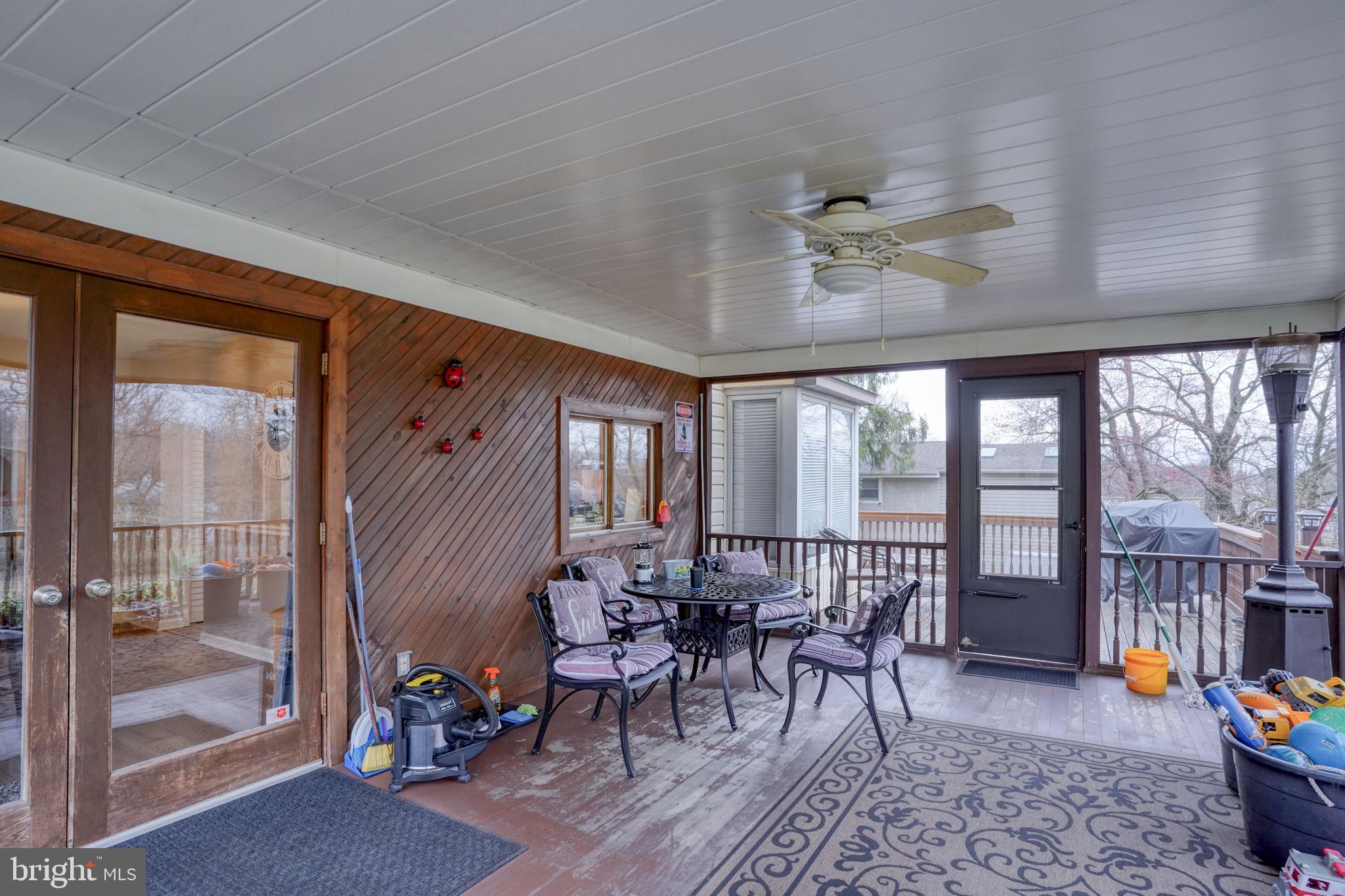 3850 Naamans Creek Road Upper Chichester, PA 19061 - Photo 23 of 53 a view of a dining room with furniture window and outside view