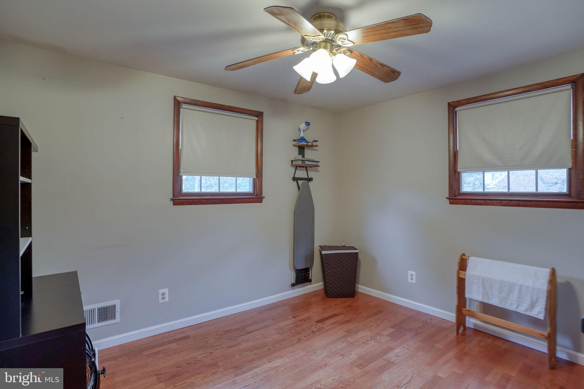 3850 Naamans Creek Road Upper Chichester, PA 19061 - Photo 32 of 53 a view of an empty room with a window and a dresser