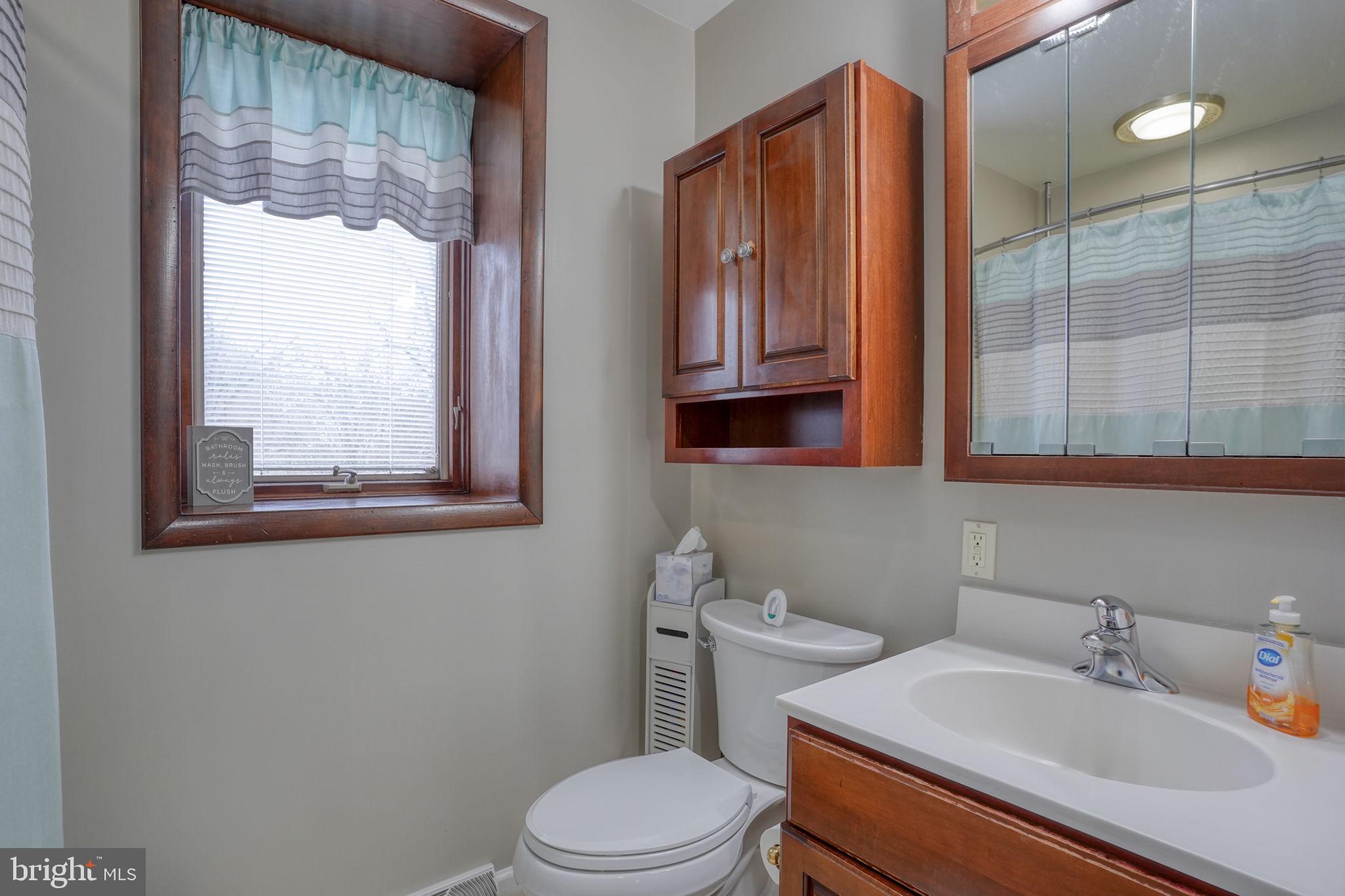 3850 Naamans Creek Road Upper Chichester, PA 19061 - Photo 36 of 53 a bathroom with a sink toilet and shower