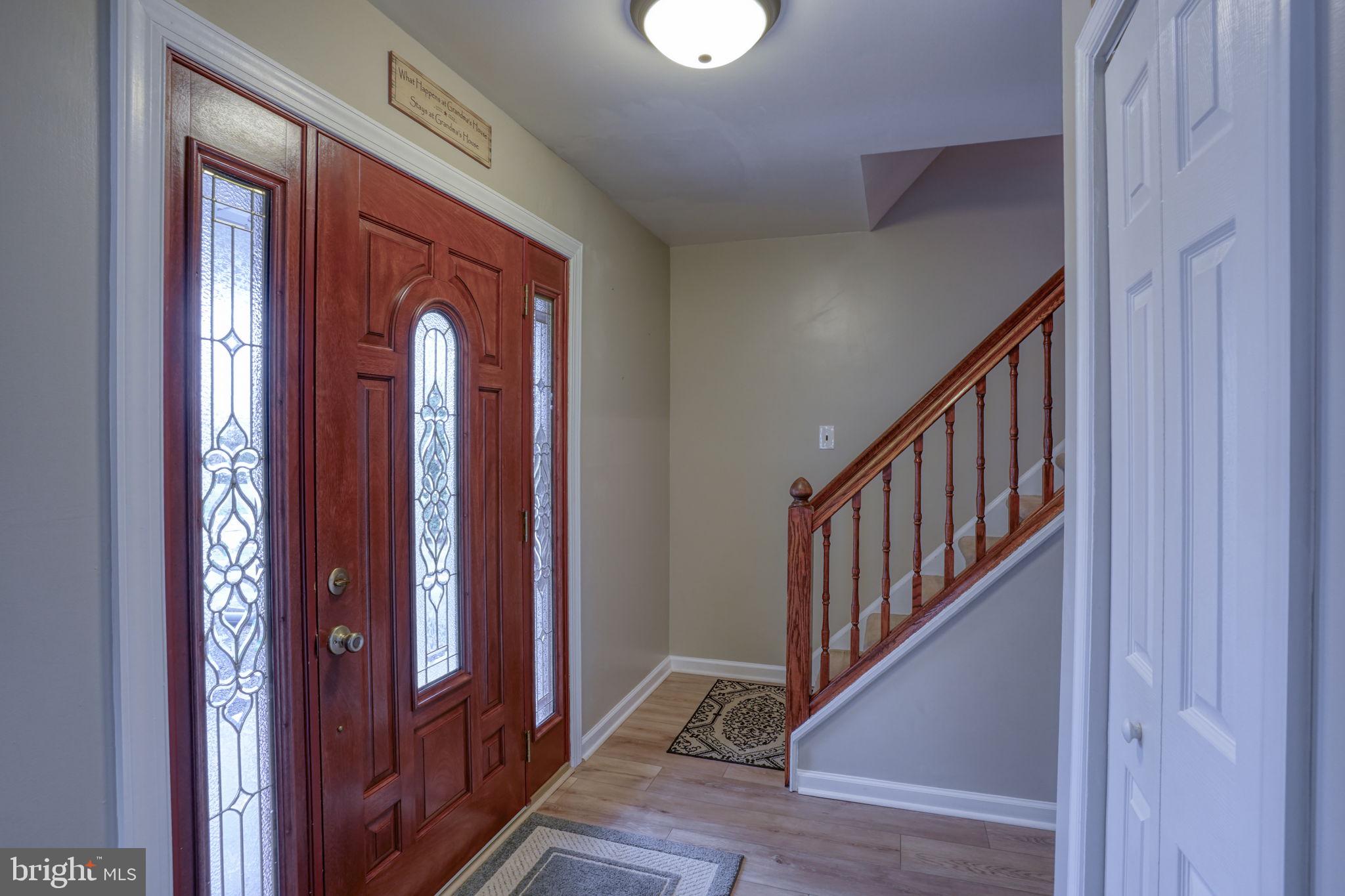 3850 Naamans Creek Road Upper Chichester, PA 19061 - Photo 4 of 53 a view of front door with wooden floor