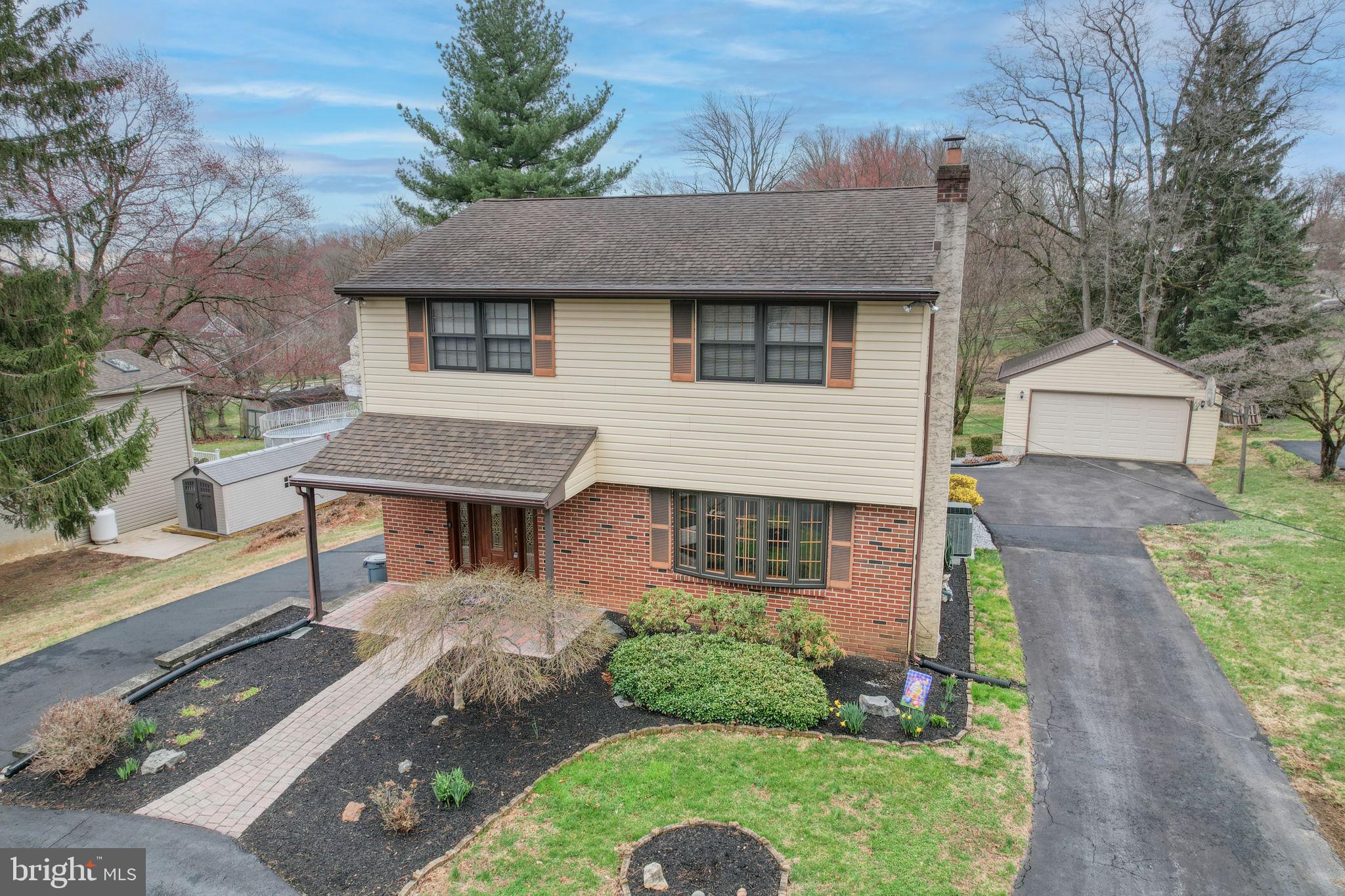 3850 Naamans Creek Road Upper Chichester, PA 19061 - Photo 51 of 53 front view of a house with a yard