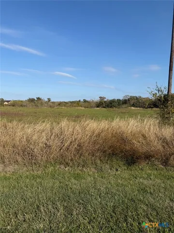 a view of a lake with a city