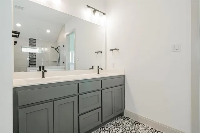 an empty room with a empty space and windows