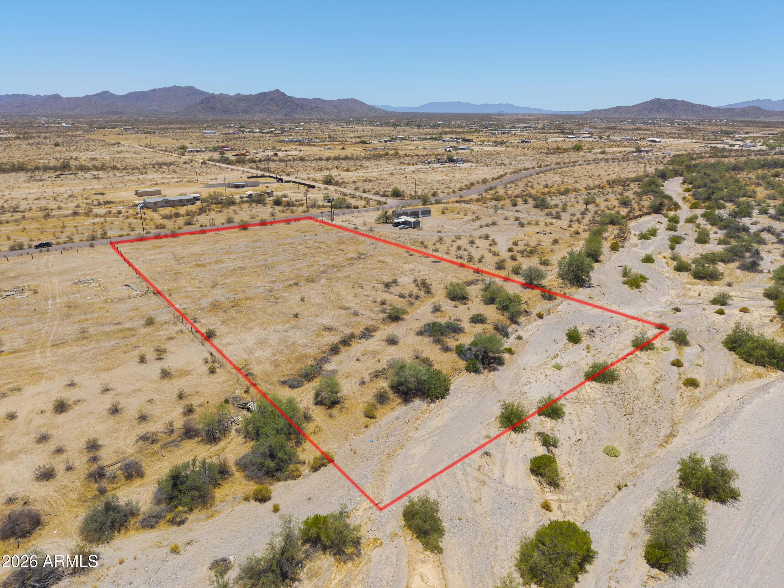 54650 West Ivory Road, Unit 57 Maricopa, AZ 85139 - Photo 6 of 17 an aerial view of residential houses with outdoor space