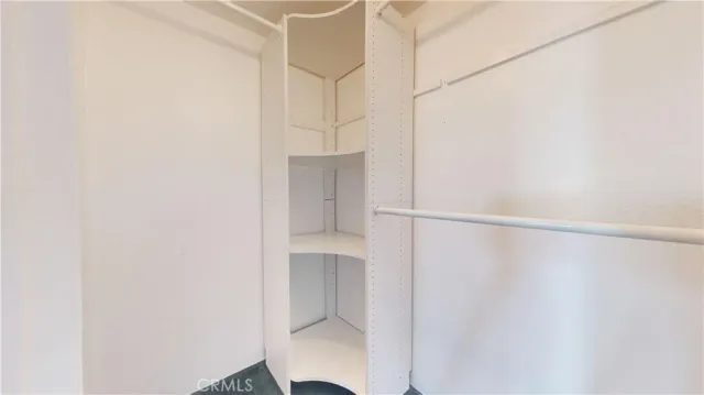 a bathroom with a sink a toilet and shower curtain