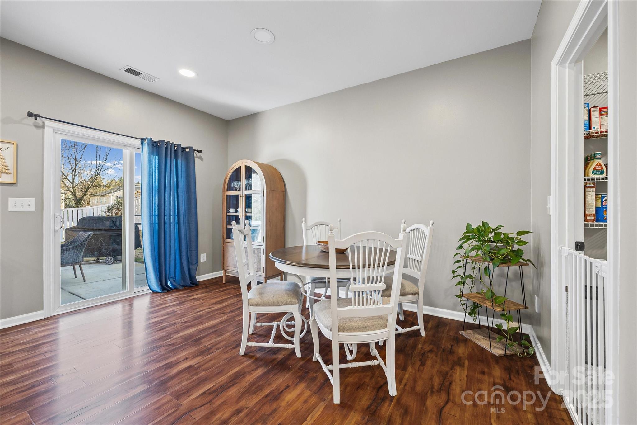 422 Garden Grove Road Fort Mill, SC 29708 - Photo 10 of 39 a view of a dining room with furniture and wooden floor