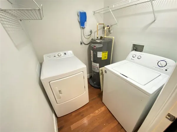 a utility room with dryer and washer