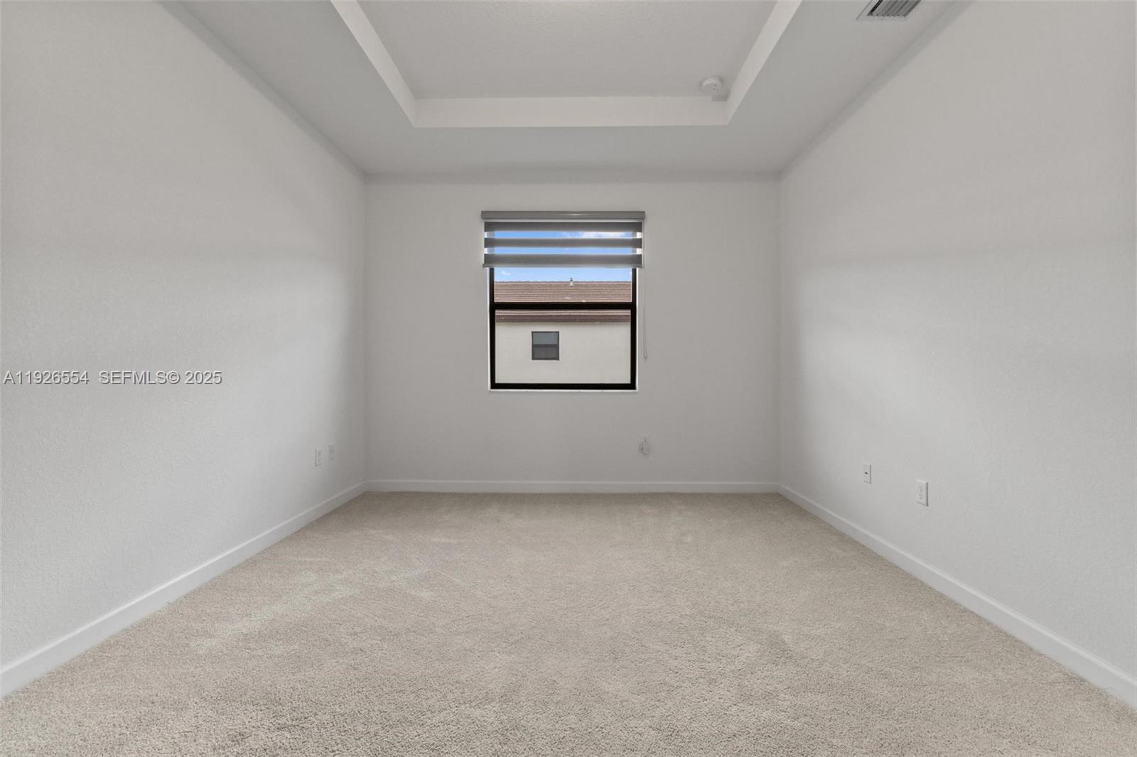 23016 Southwest 129th Court Miami, FL 33177 - Photo 22 of 39 an empty room with windows