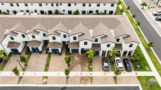 a view of a balcony with chairs