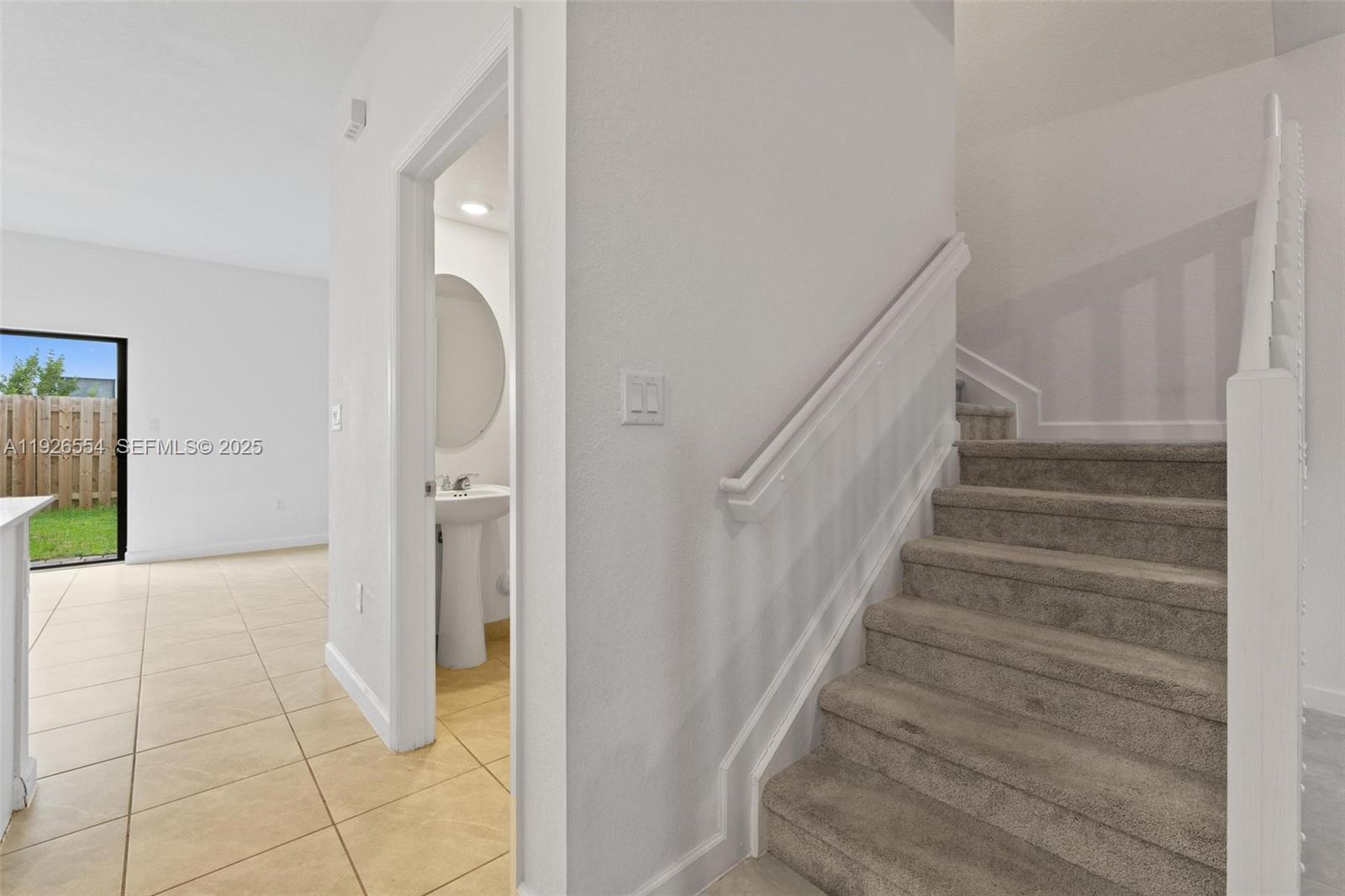 23016 Southwest 129th Court Miami, FL 33177 - Photo 7 of 39 a view of entryway and hall with wooden floor