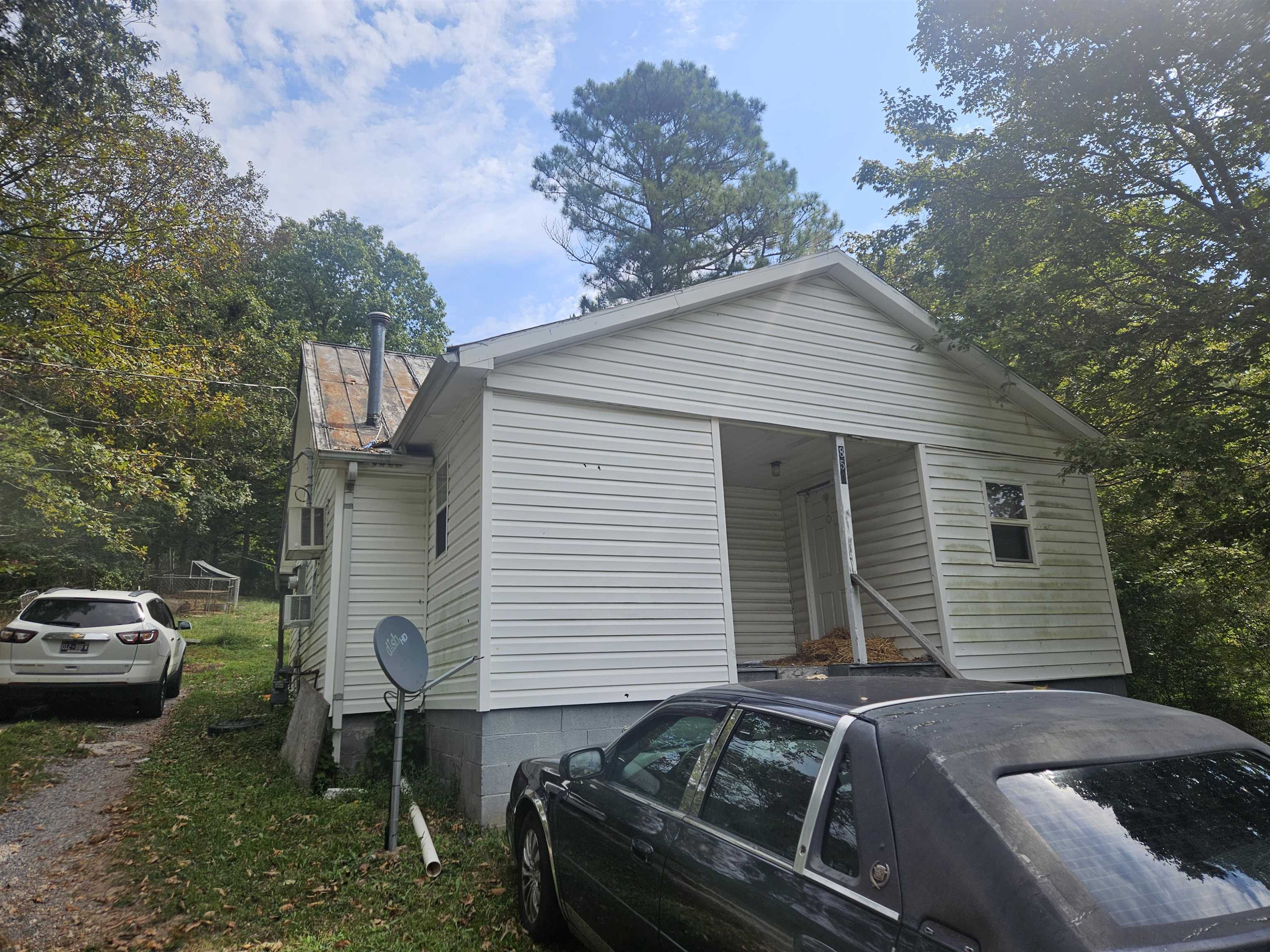 a view of a house with a back yard