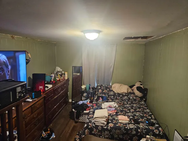 a room with lots of flower plants