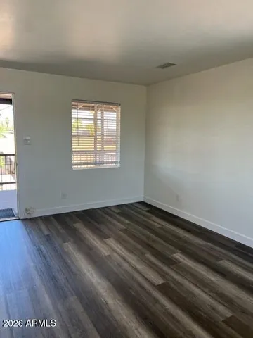 a view of an empty room and window