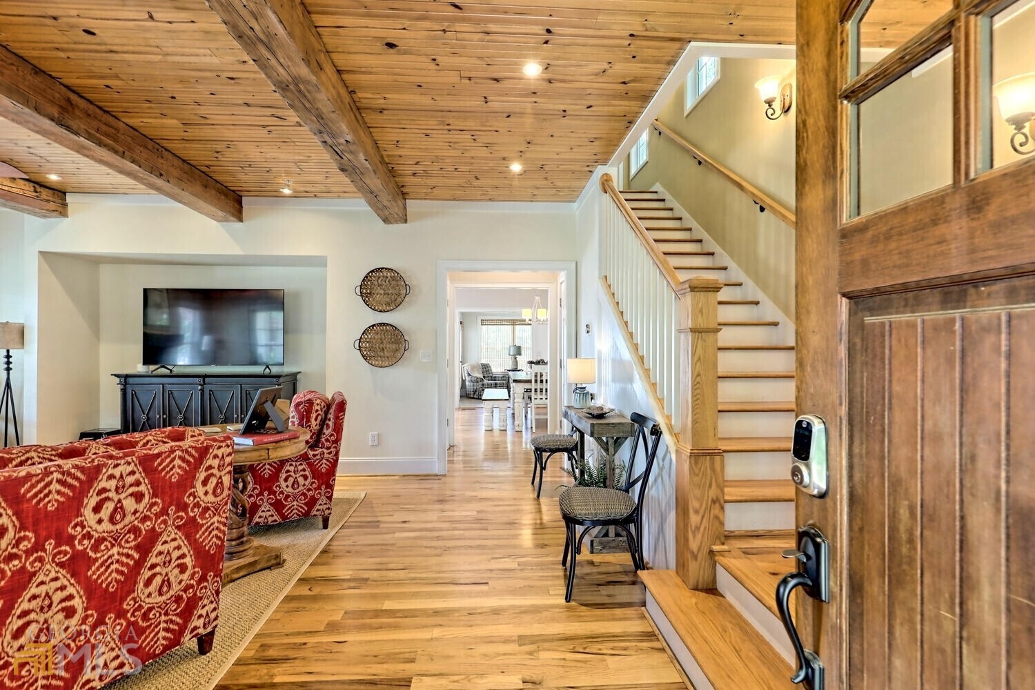 643 Washington Street Clarkesville, GA 30523 - Photo 14 of 56 a living room with furniture and a flat screen tv