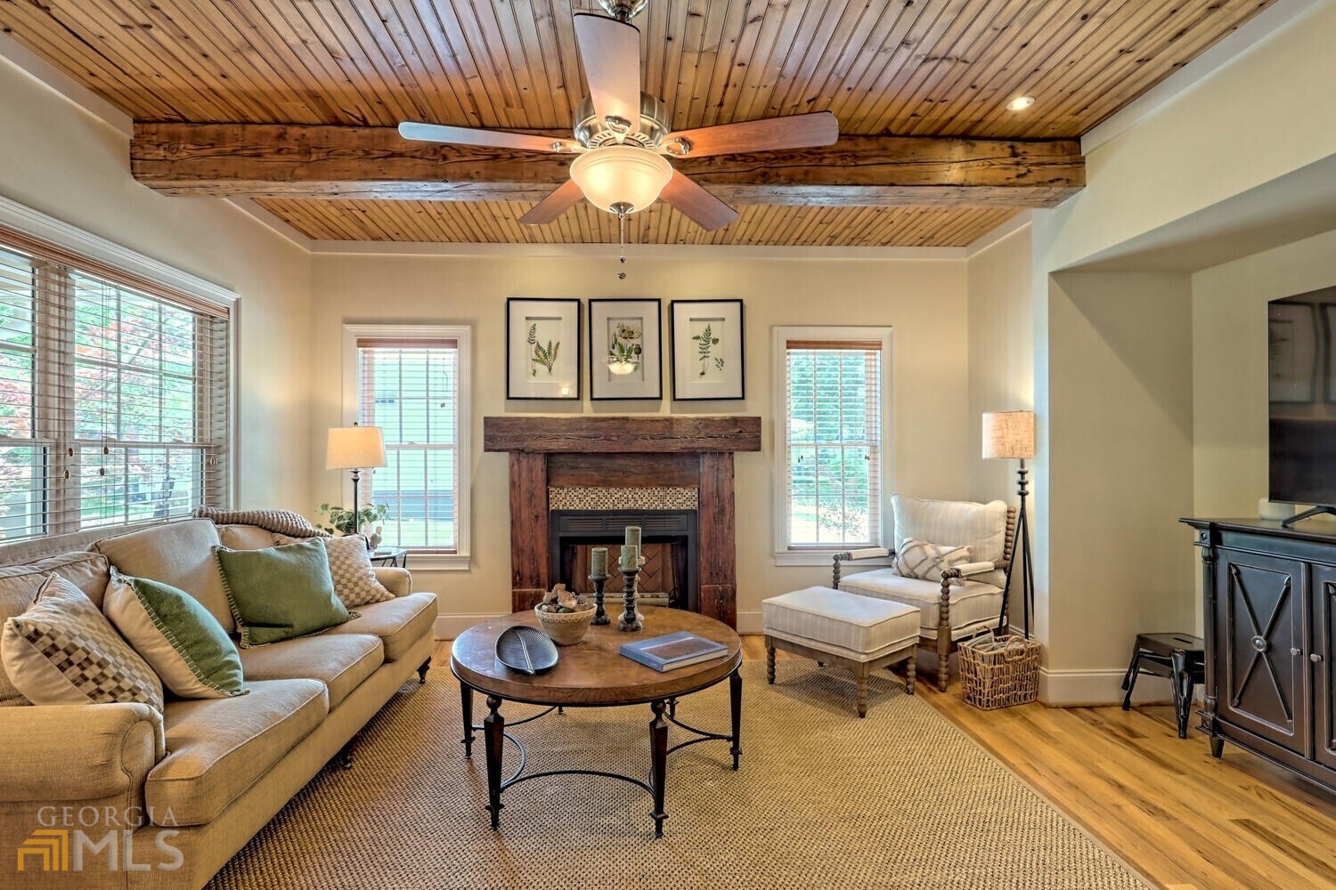 643 Washington Street Clarkesville, GA 30523 - Photo 16 of 56 a living room with furniture and a fireplace