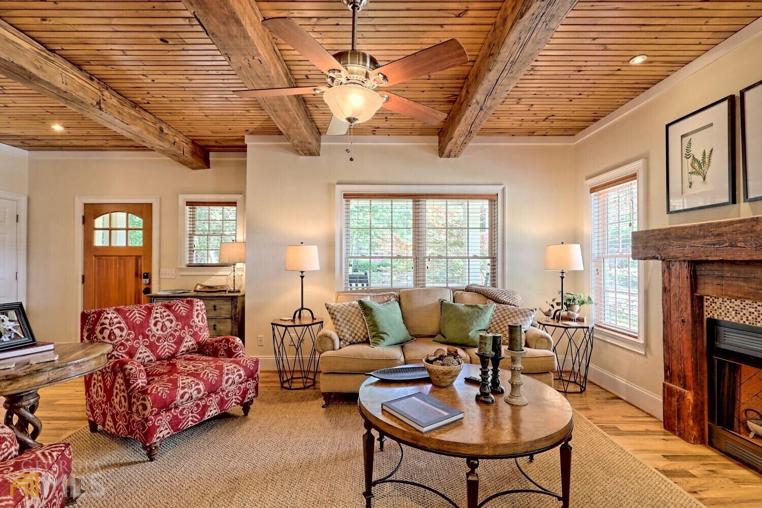 643 Washington Street Clarkesville, GA 30523 - Photo 17 of 56 a living room with furniture and a fireplace