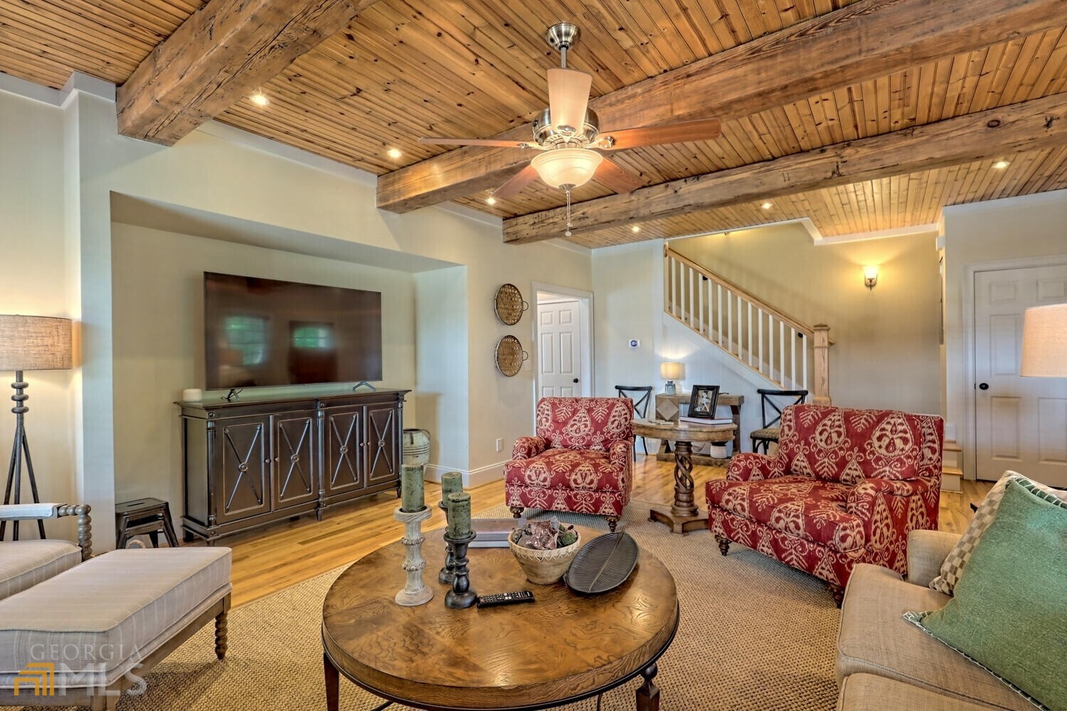 643 Washington Street Clarkesville, GA 30523 - Photo 18 of 56 a living room with furniture and a flat screen tv