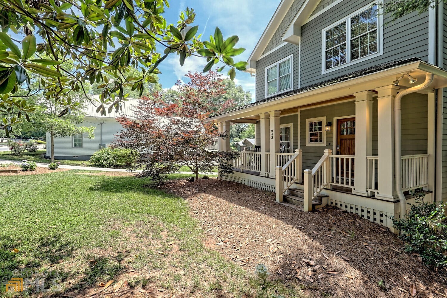 643 Washington Street Clarkesville, GA 30523 - Photo 2 of 56 a view of a house with backyard porch and sitting area