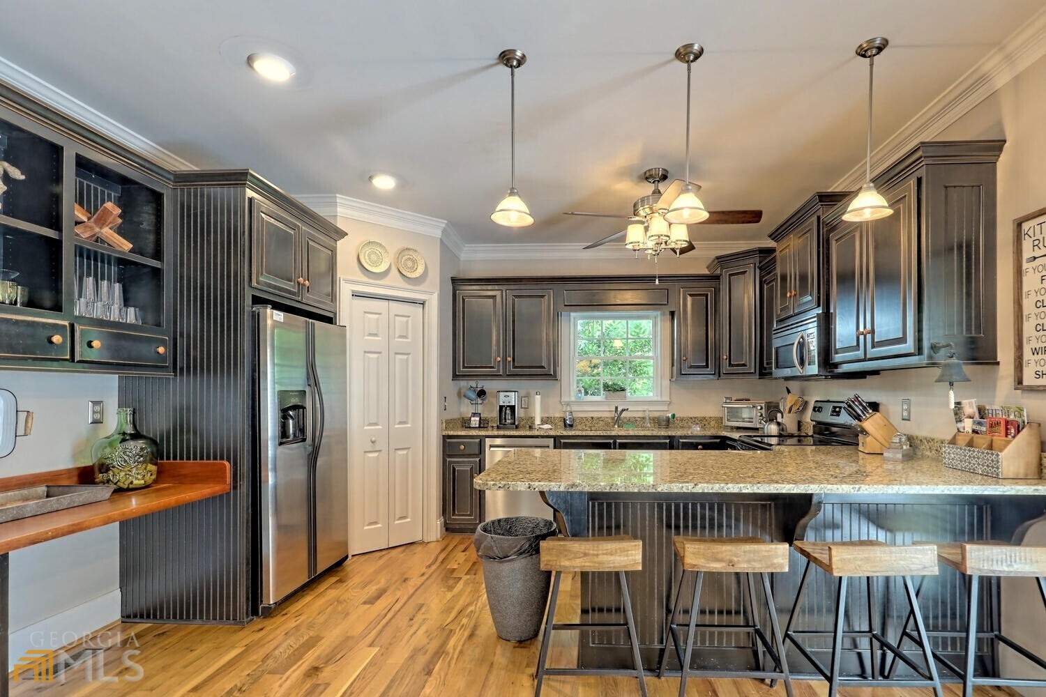 643 Washington Street Clarkesville, GA 30523 - Photo 21 of 56 a kitchen with a sink stove and refrigerator