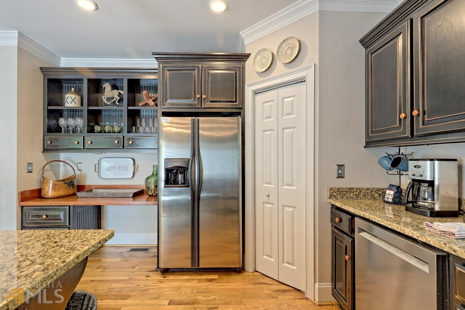 643 Washington Street Clarkesville, GA 30523 - Photo 24 of 56 a kitchen with stainless steel appliances granite countertop a refrigerator and a stove top oven