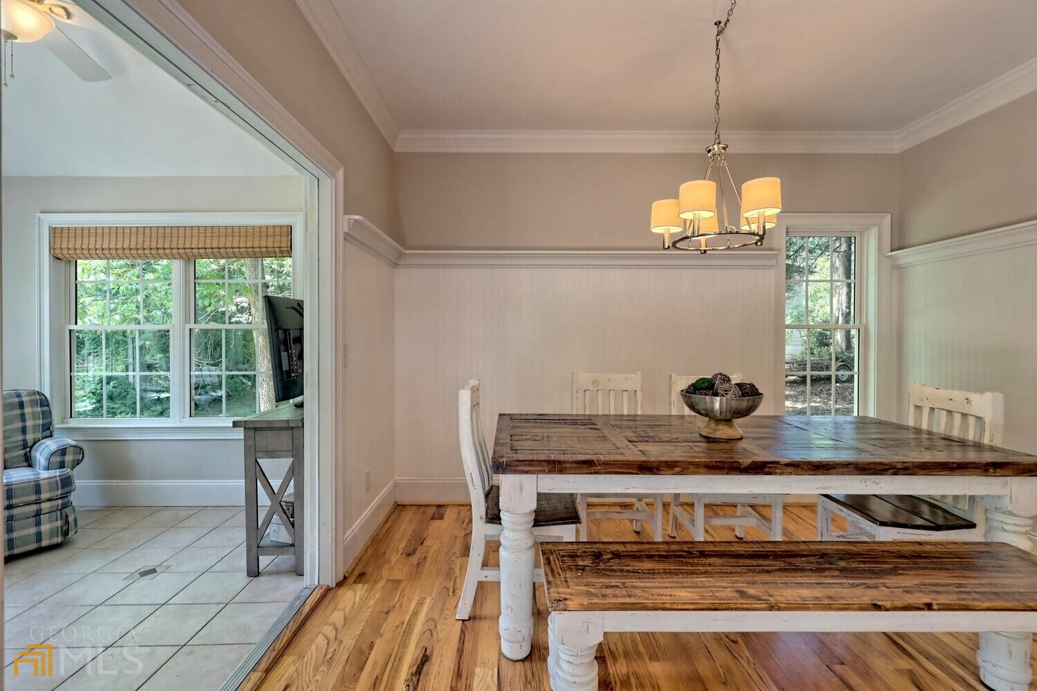 643 Washington Street Clarkesville, GA 30523 - Photo 27 of 56 a kitchen with a stove and a chandelier