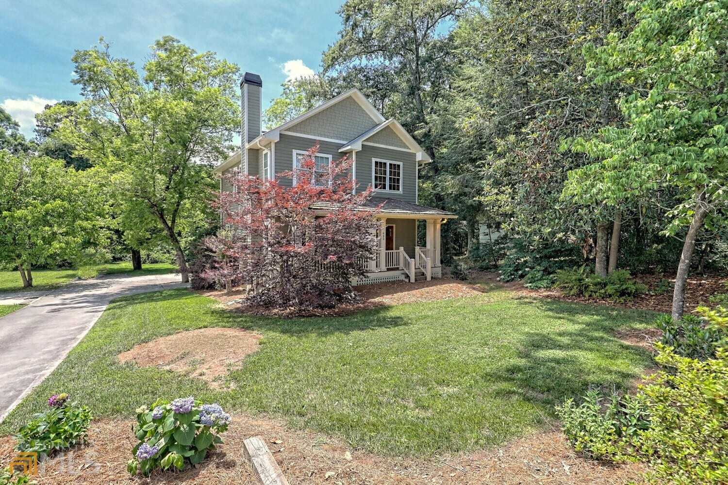 643 Washington Street Clarkesville, GA 30523 - Photo 3 of 56 a front view of a house with garden