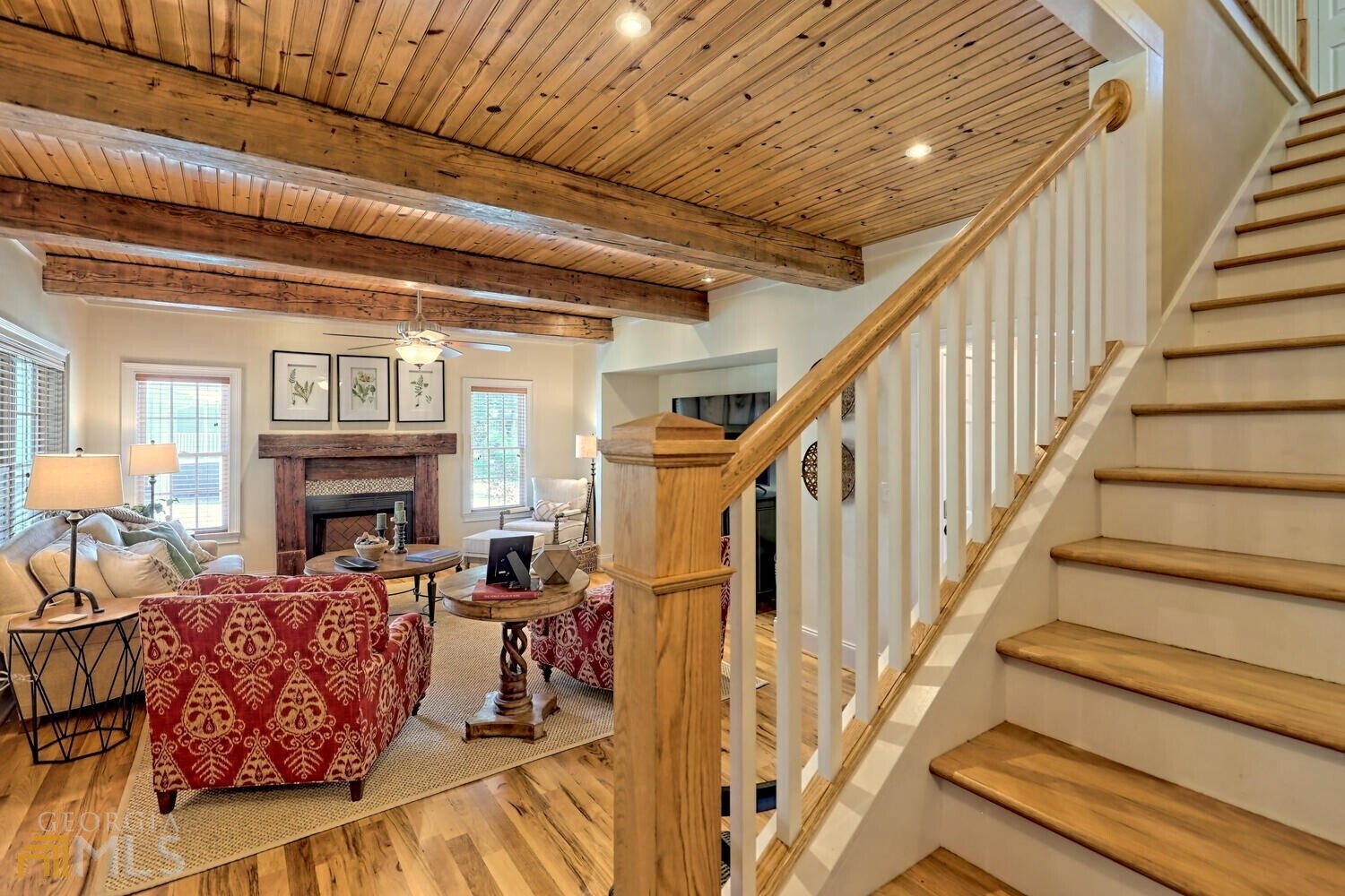 643 Washington Street Clarkesville, GA 30523 - Photo 37 of 56 a view of a livingroom with furniture a fireplace chandeliers