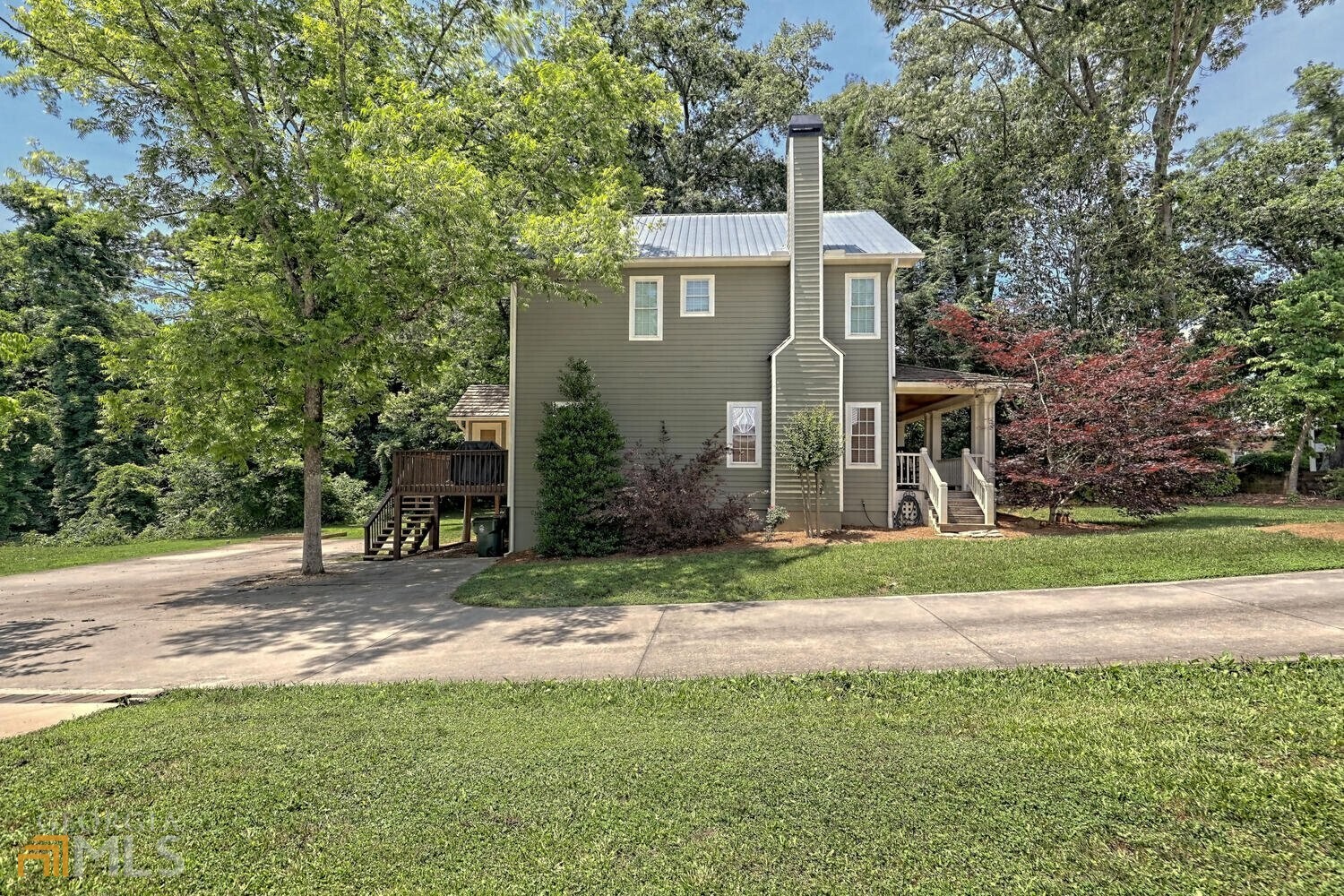 643 Washington Street Clarkesville, GA 30523 - Photo 8 of 56 a front view of a house with a yard