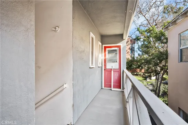 a balcony with an outdoor view