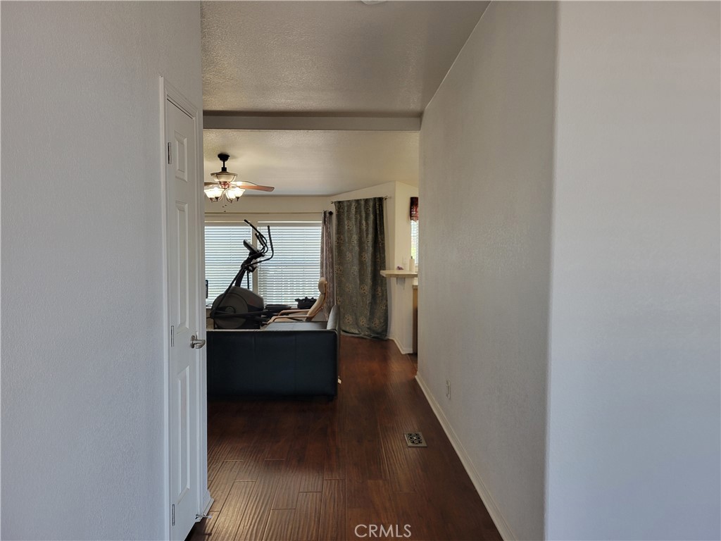 58804 Ramsey Road Anza, CA 92539 - Photo 11 of 51 a hall way with wooden floor and furniture