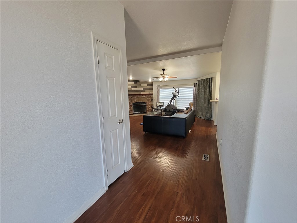 58804 Ramsey Road Anza, CA 92539 - Photo 21 of 51 a living room with furniture and a wooden floor