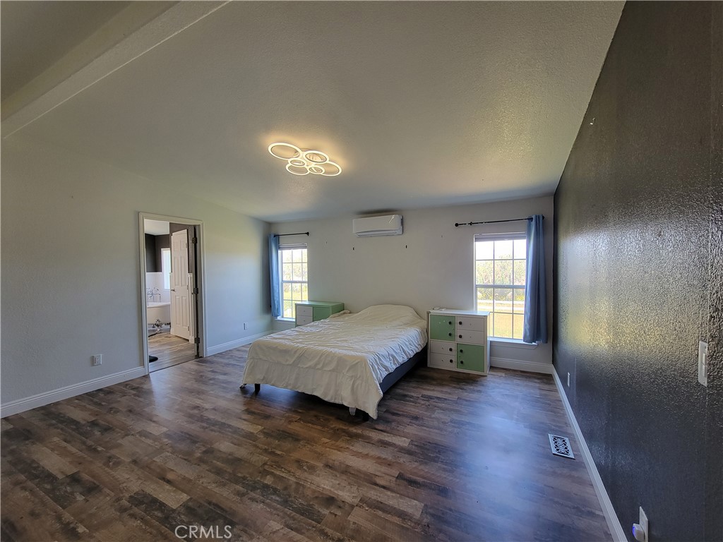 58804 Ramsey Road Anza, CA 92539 - Photo 22 of 51 a bedroom with a bed and window