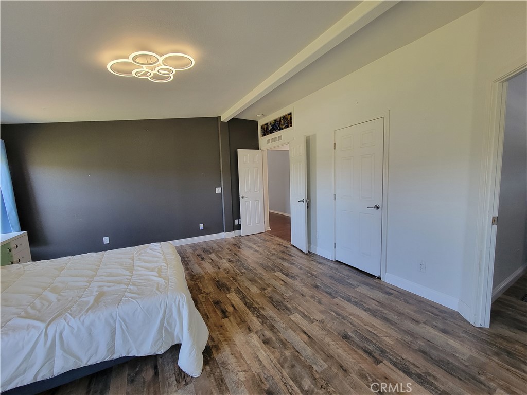 58804 Ramsey Road Anza, CA 92539 - Photo 25 of 51 a bedroom with a bed and a window