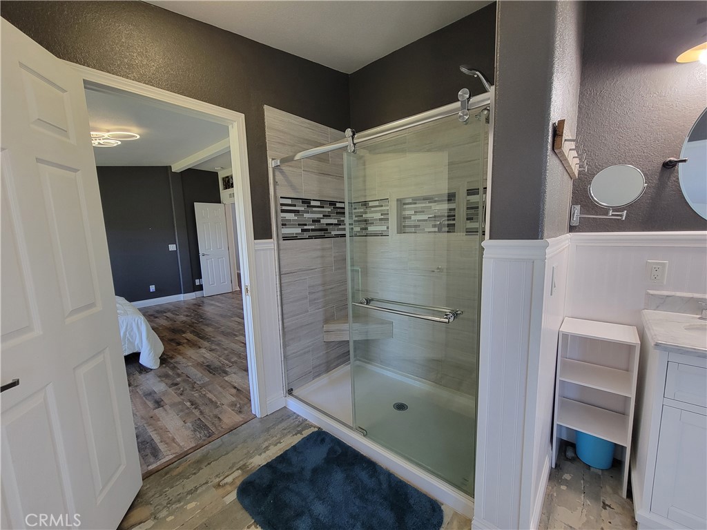 58804 Ramsey Road Anza, CA 92539 - Photo 29 of 51 a bathroom with a shower and a sink