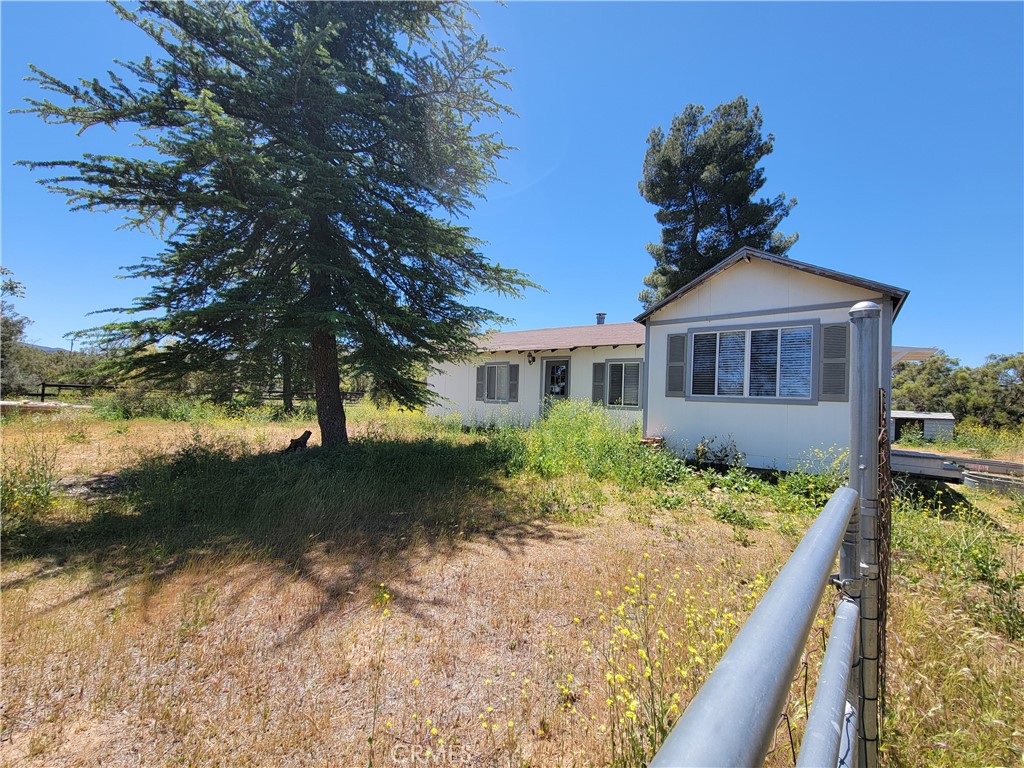 58804 Ramsey Road Anza, CA 92539 - Photo 43 of 51 a front view of a house with a yard