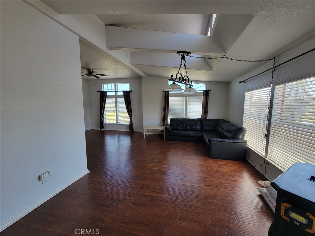 58804 Ramsey Road Anza, CA 92539 - Photo 6 of 51 a living room with hard wood floors and a ceiling fan