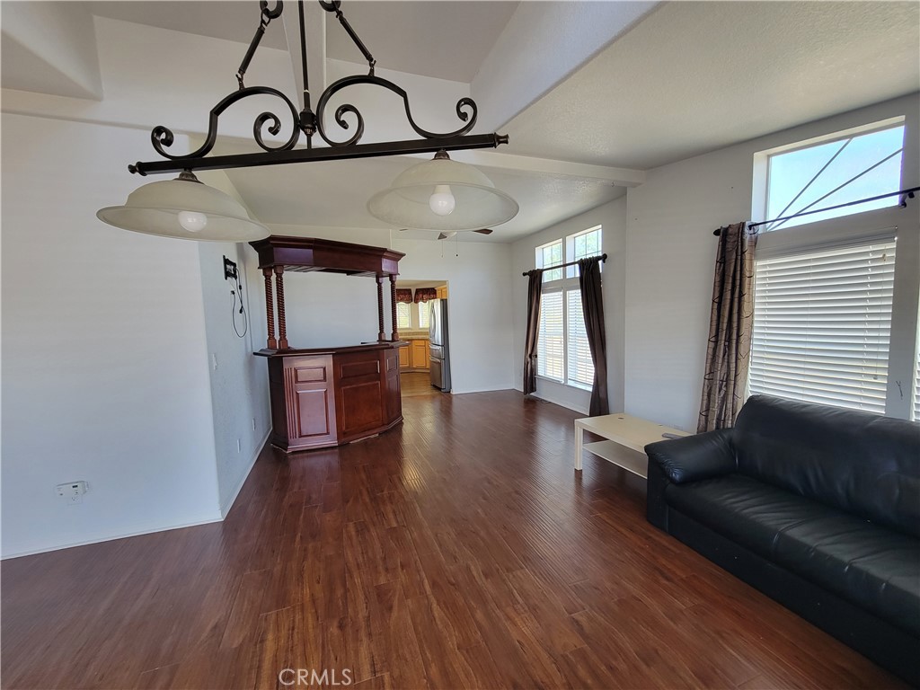 58804 Ramsey Road Anza, CA 92539 - Photo 7 of 51 a view of a hallway with wooden floor and windows