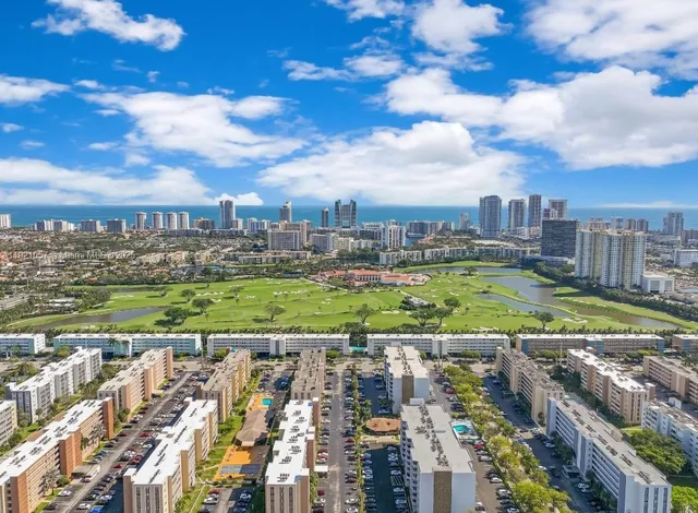 an aerial view of a house with a garden