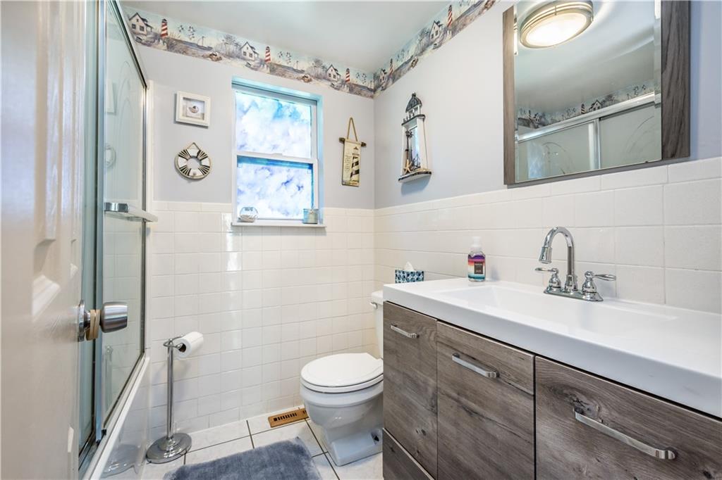 10 Swihart Road Canonsburg, PA 15317 - Photo 17 of 25 !st of the 4 FULL bathrooms in this home. Cermaic flooring, updated sink/cabinets