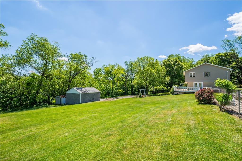 This home has a 1 car integral garage and a 1 car detached garage PLUS plenty of room for any additional parking