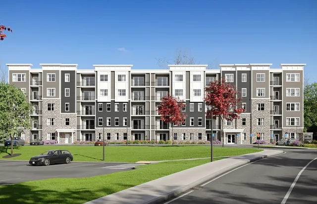 a view of a building with a yard