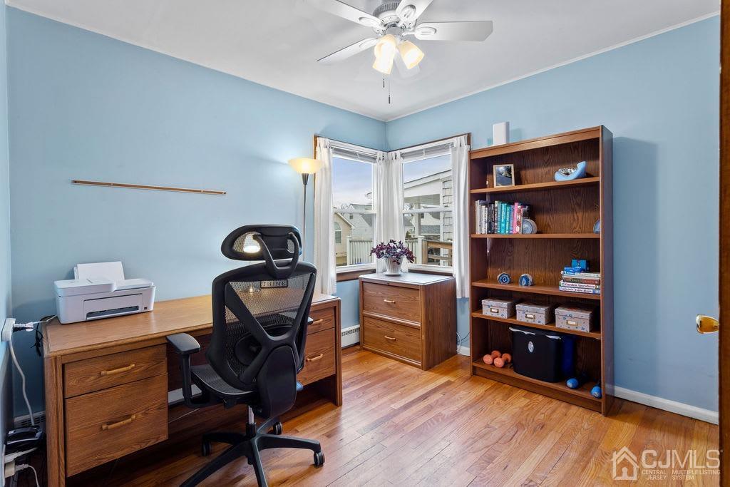 155 East Hill Road Colonia, NJ 07067 - Photo 20 of 37 a view of a workspace with furniture and a window