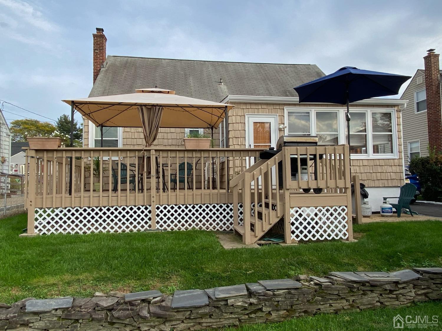 155 East Hill Road Colonia, NJ 07067 - Photo 28 of 37 a view of a house with a yard