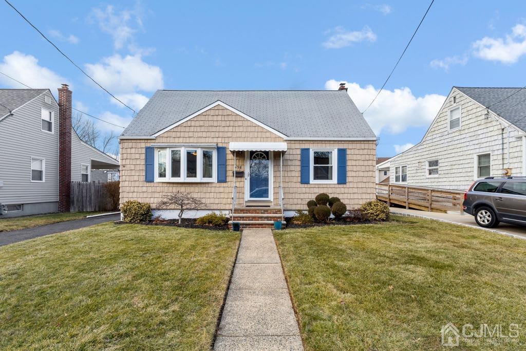 155 East Hill Road Colonia, NJ 07067 - Photo 3 of 37 a view of a house with swimming pool and sitting area