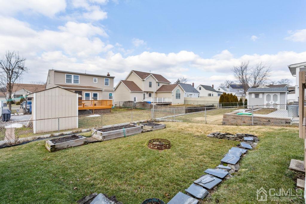 155 East Hill Road Colonia, NJ 07067 - Photo 32 of 37 a view of a house with swimming pool and a yard